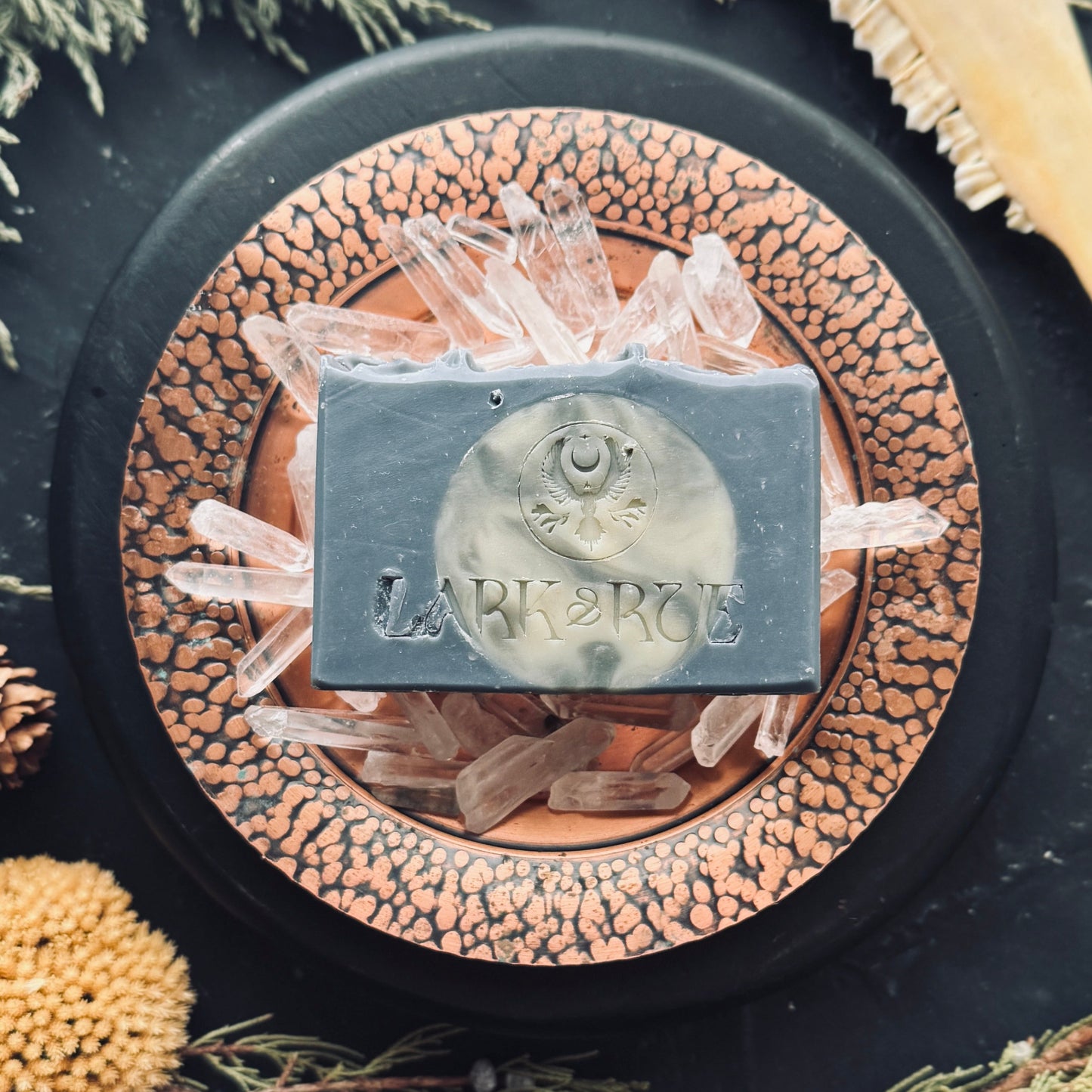 Dusty blue bar of soap with full moon embed.